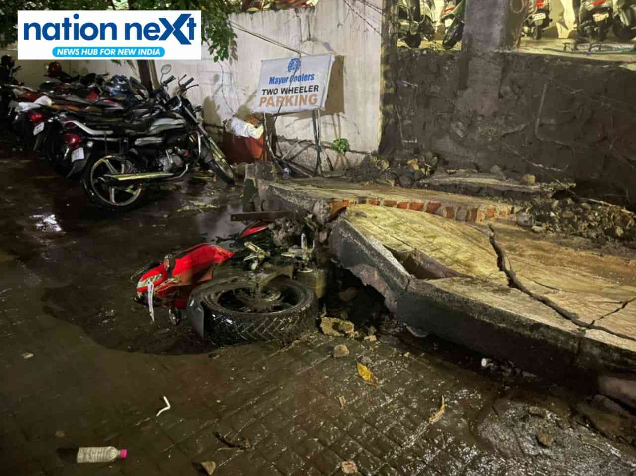 The collapsed wall on Vishesh Agrawal's car?

